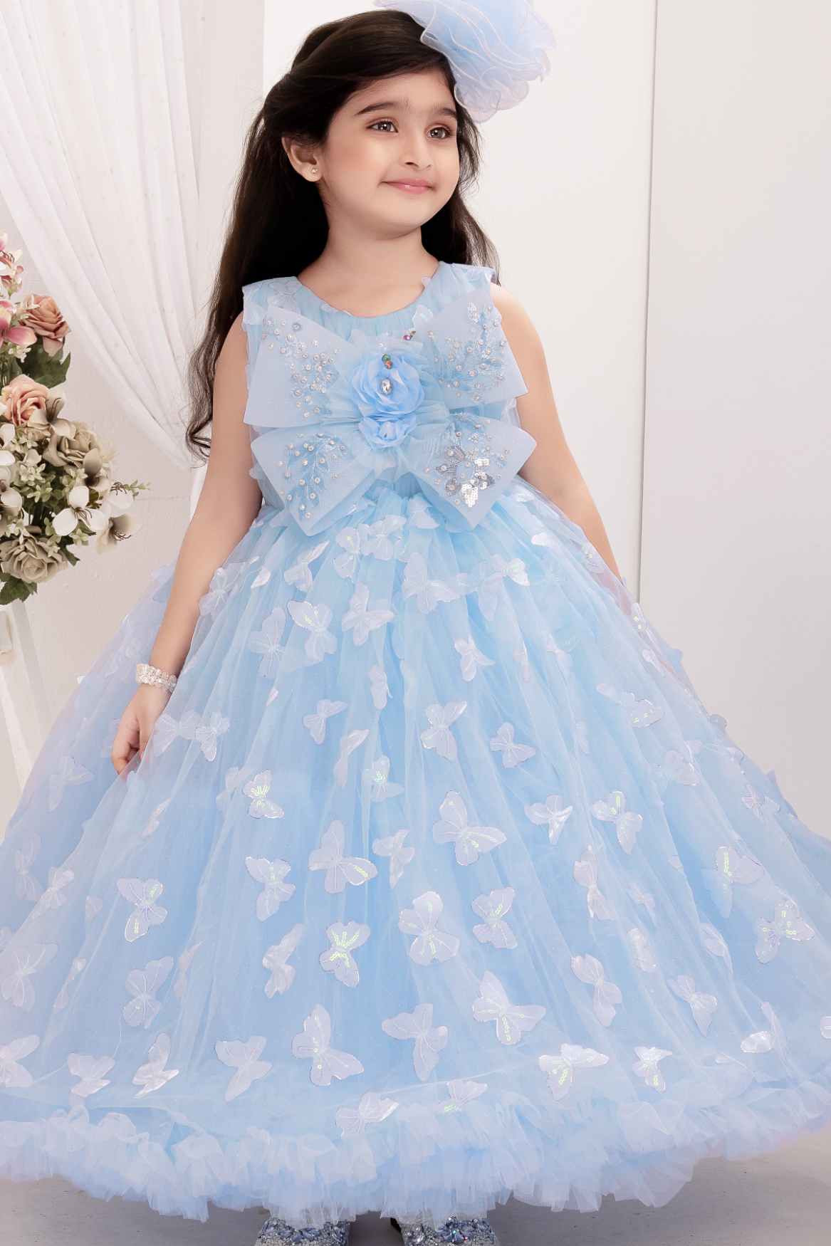 Sky Blue Floral And Butterfly Embellished With Sequins Work Party Wear Gown For Girls