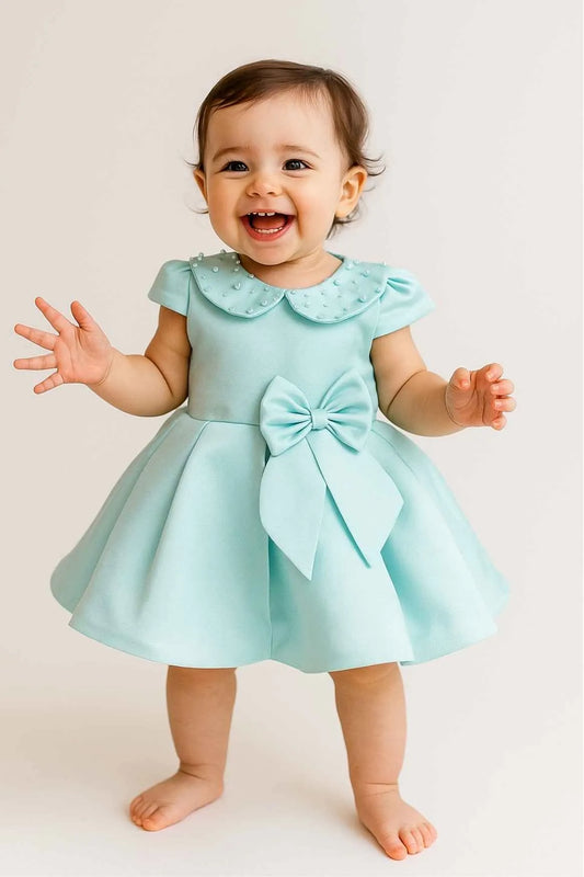 Sea Green Party Frock With Pearl Collar And Bow Embellishment For Girls