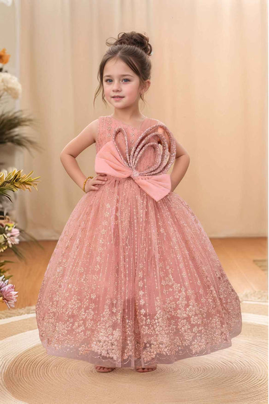 Peach Gown With Bow Embellished And Shimmer Printed For Girls