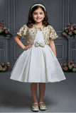 Ivory Party Frock with Gold Embellished Shrug And Bow Waist Accent For Girls