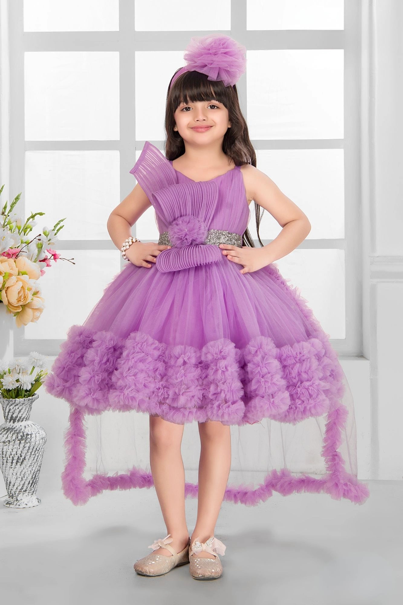 Lavender Embellished Party Wear Frock with Pleated Bodice and 3D Ruffle Hemline For Girls