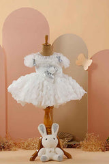 Cream Ruffled And Bow Embellished Frock For Girls