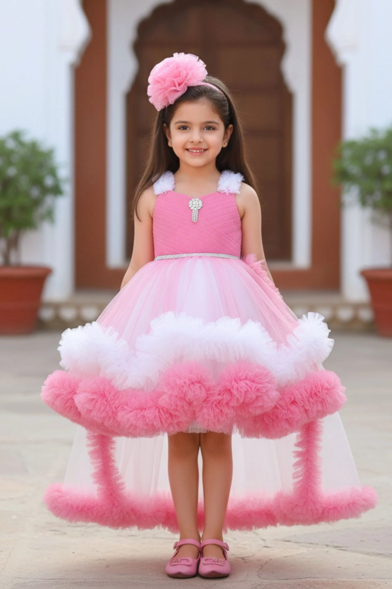 Pink Ruffle Party Frock With Stone Embellished And High-Low Hem For Girls