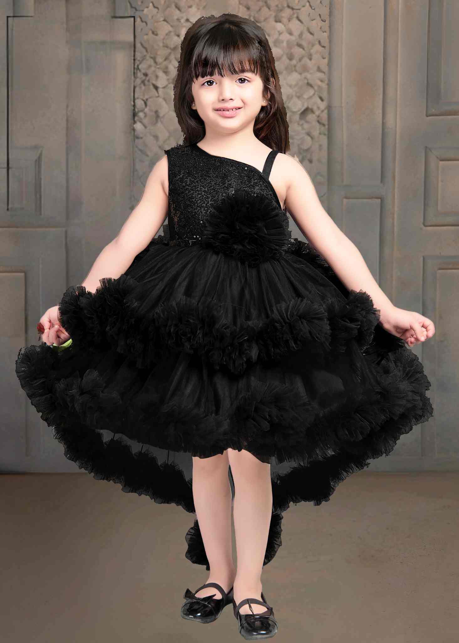 Shimmer Black Tailback Party Wear Frock With Flower Embellishment  For Girls