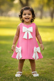 Baby Pink Party Frock with White Bow Accents For Girls