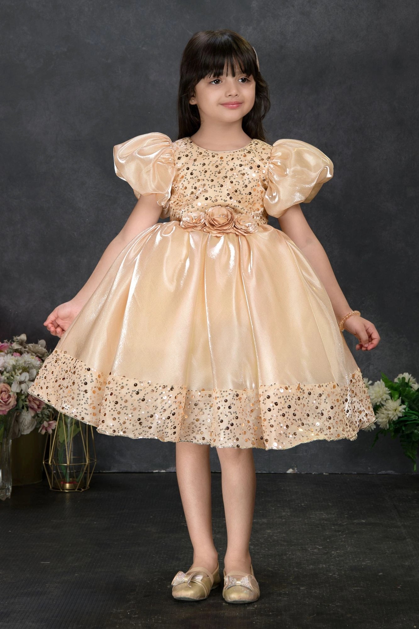 Golden Sequin Party Wear Frock with Puffy Sleeves and Floral Waist Detail For Girls