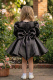 Black Party Wear Frock with Puffy Sleeves & Statement Rose Appliqué For Girls