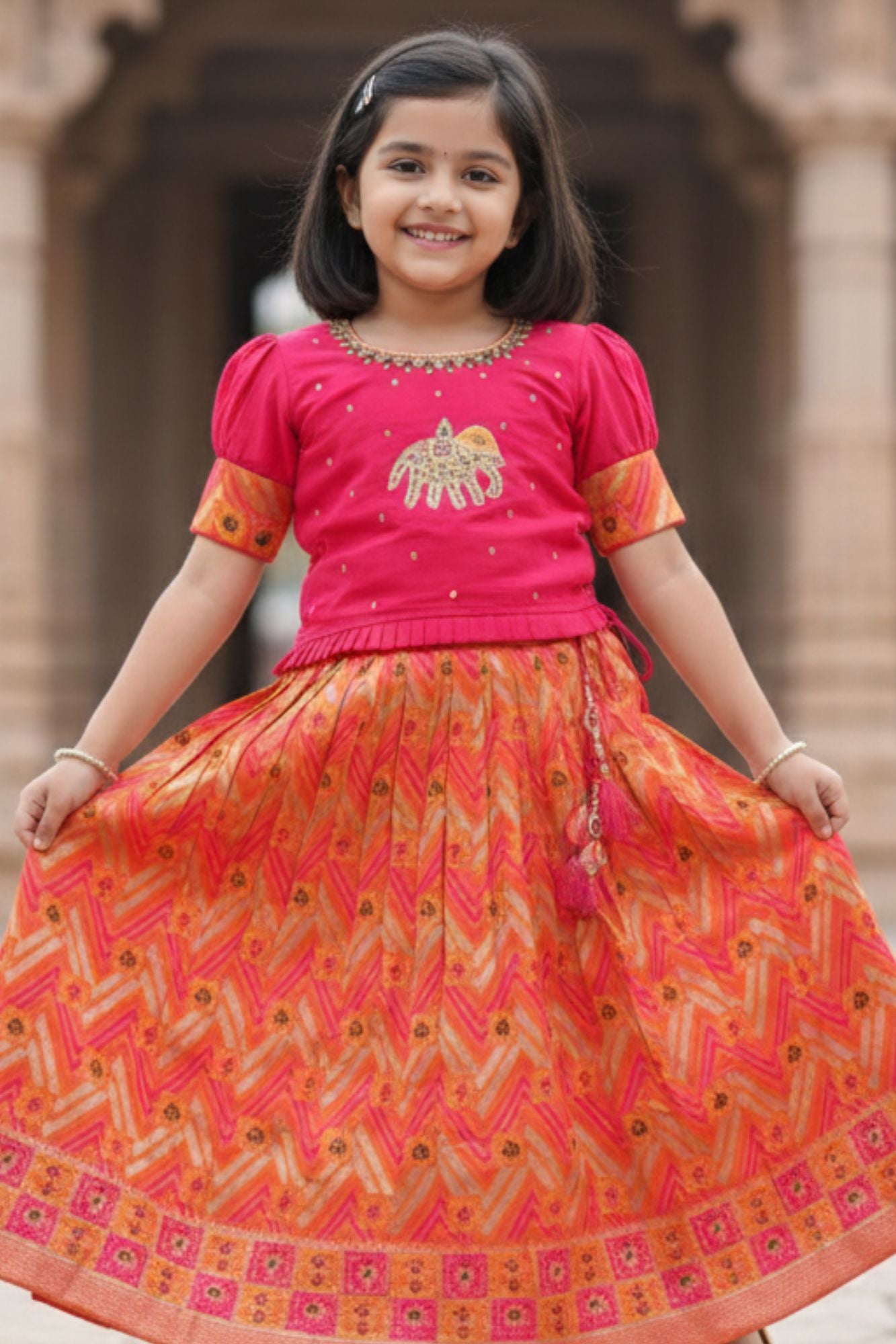 Pink And Orange Embroidered Pattu Pavadai with Elephant Motif For Girls