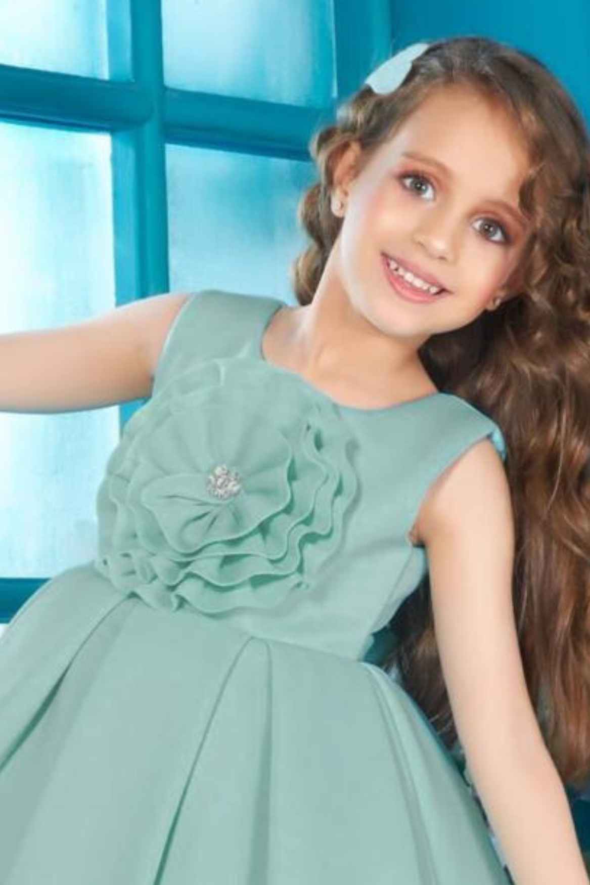 فستان حفلات باللون الأخضر البحري مزين بالورود للبنات