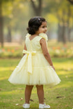 Yellow Tulle Party Wear Frock with Oversized Bow For Girls