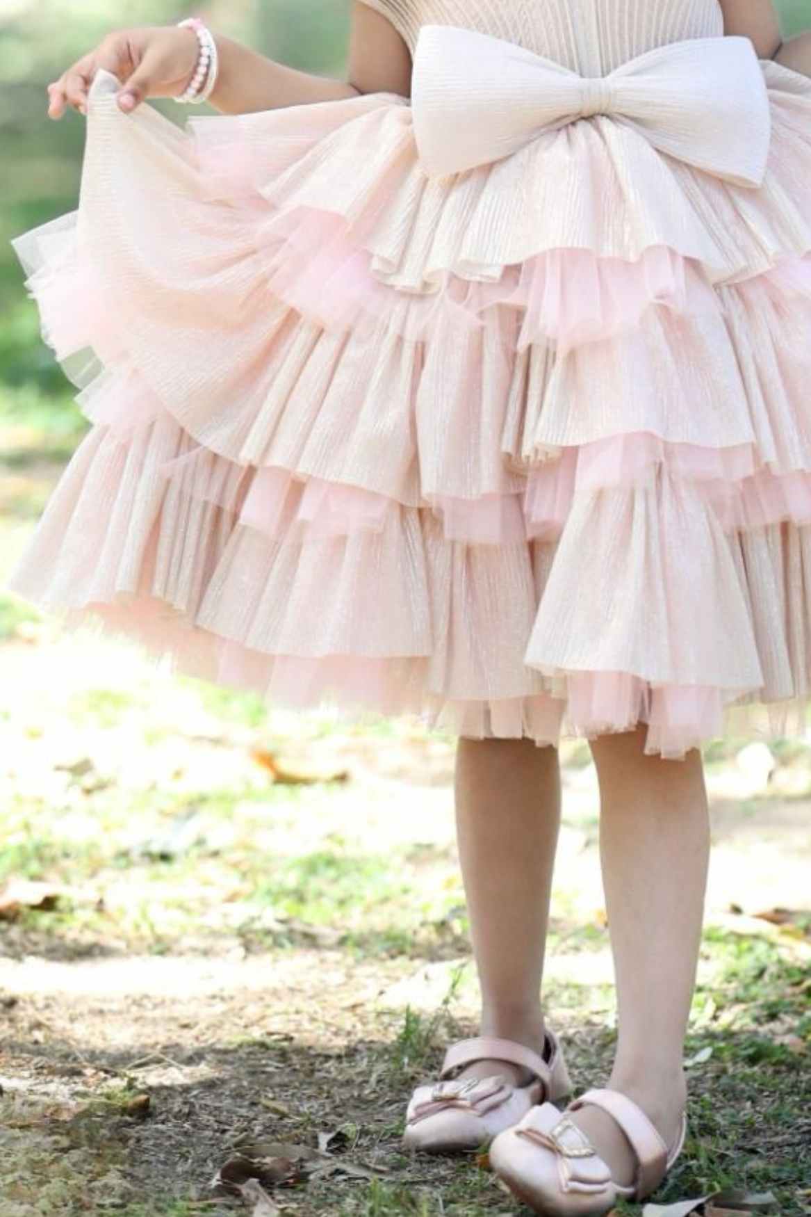 فستان حفلات مزين بفيونكة الخوخ للبنات 