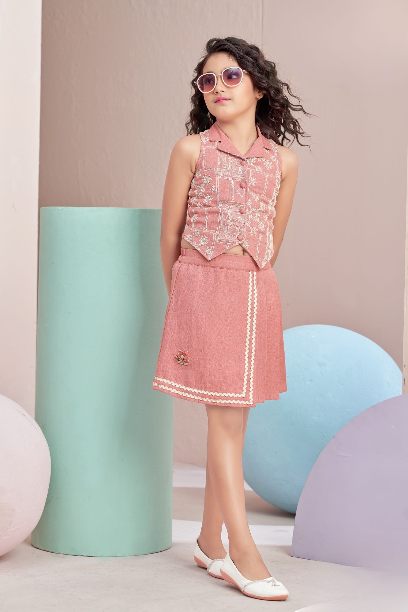 Girls Peach Skirt Set with Sleeveless Jacket Style Top