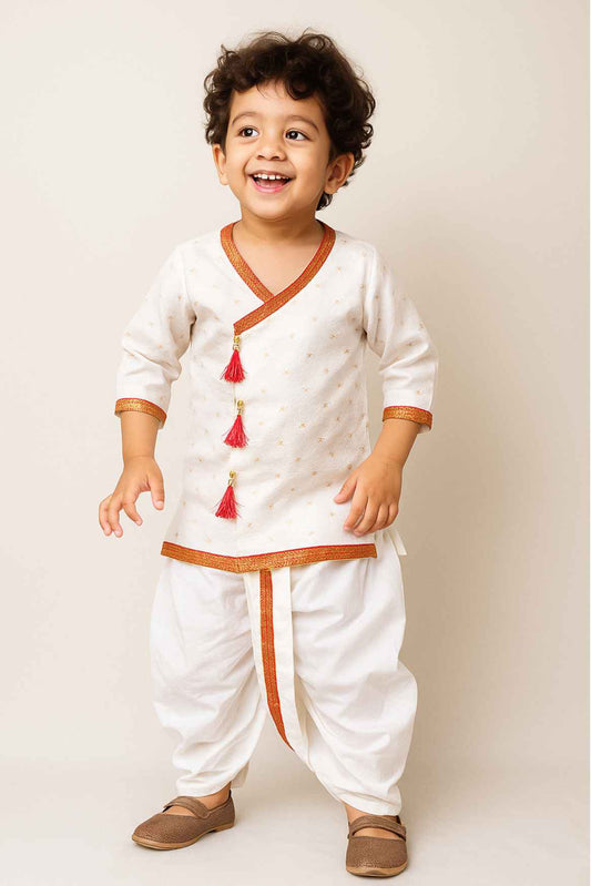 Elegant Cream And White Dhoti Kurta Set With Red Tassel Detailing For Boys