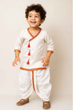Elegant Cream And White Dhoti Kurta Set With Red Tassel Detailing For Boys