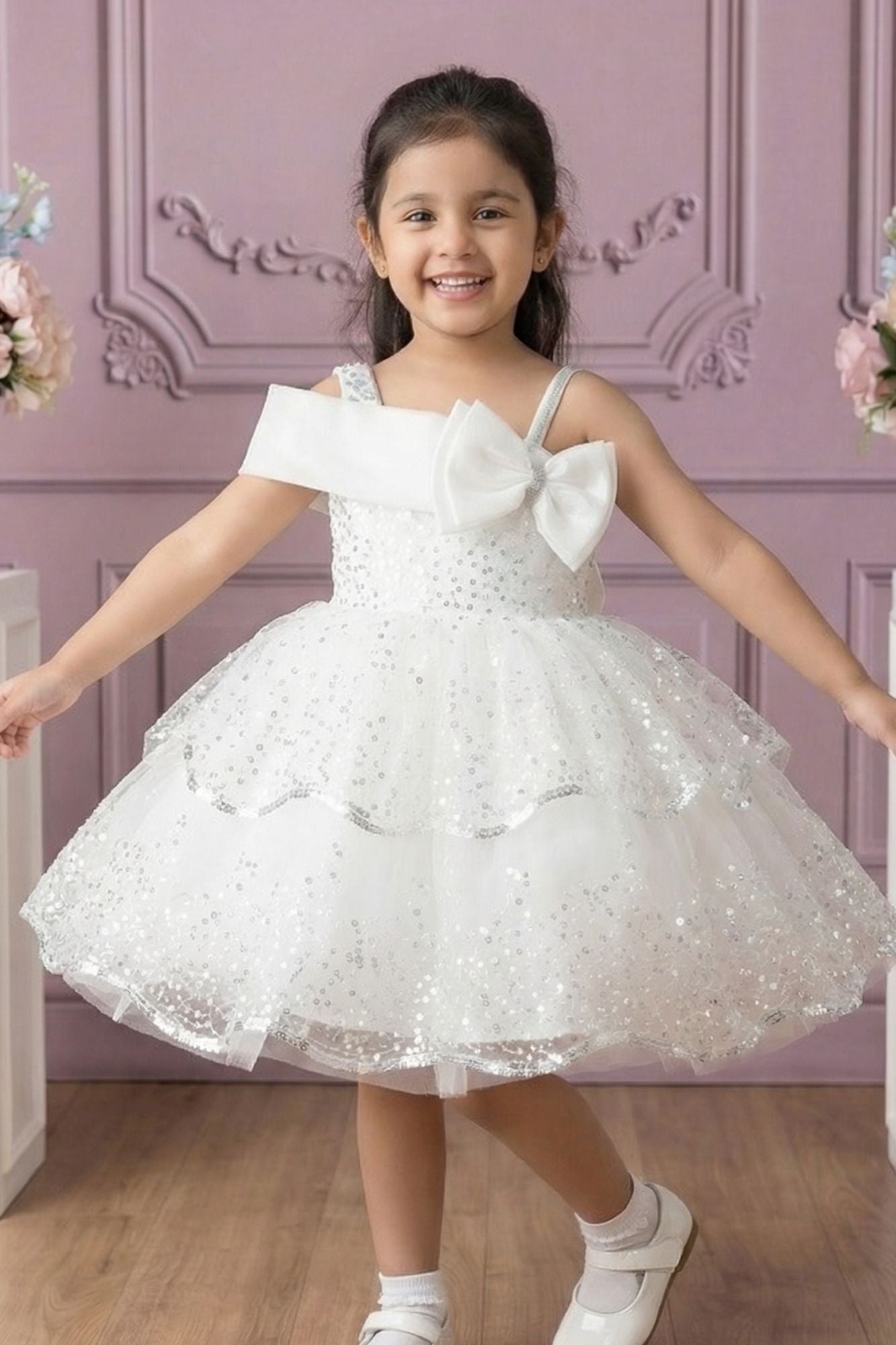 White Sequin Layered Ruffle Party Wear Frock With Statement Bow For Girls