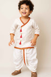Elegant Cream And White Dhoti Kurta Set With Red Tassel Detailing For Boys