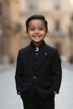 Classic Black Four Pc Suite With White Shirt Embossed Waist Coat Set For Boys