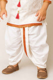 Elegant Cream And White Dhoti Kurta Set With Red Tassel Detailing For Boys