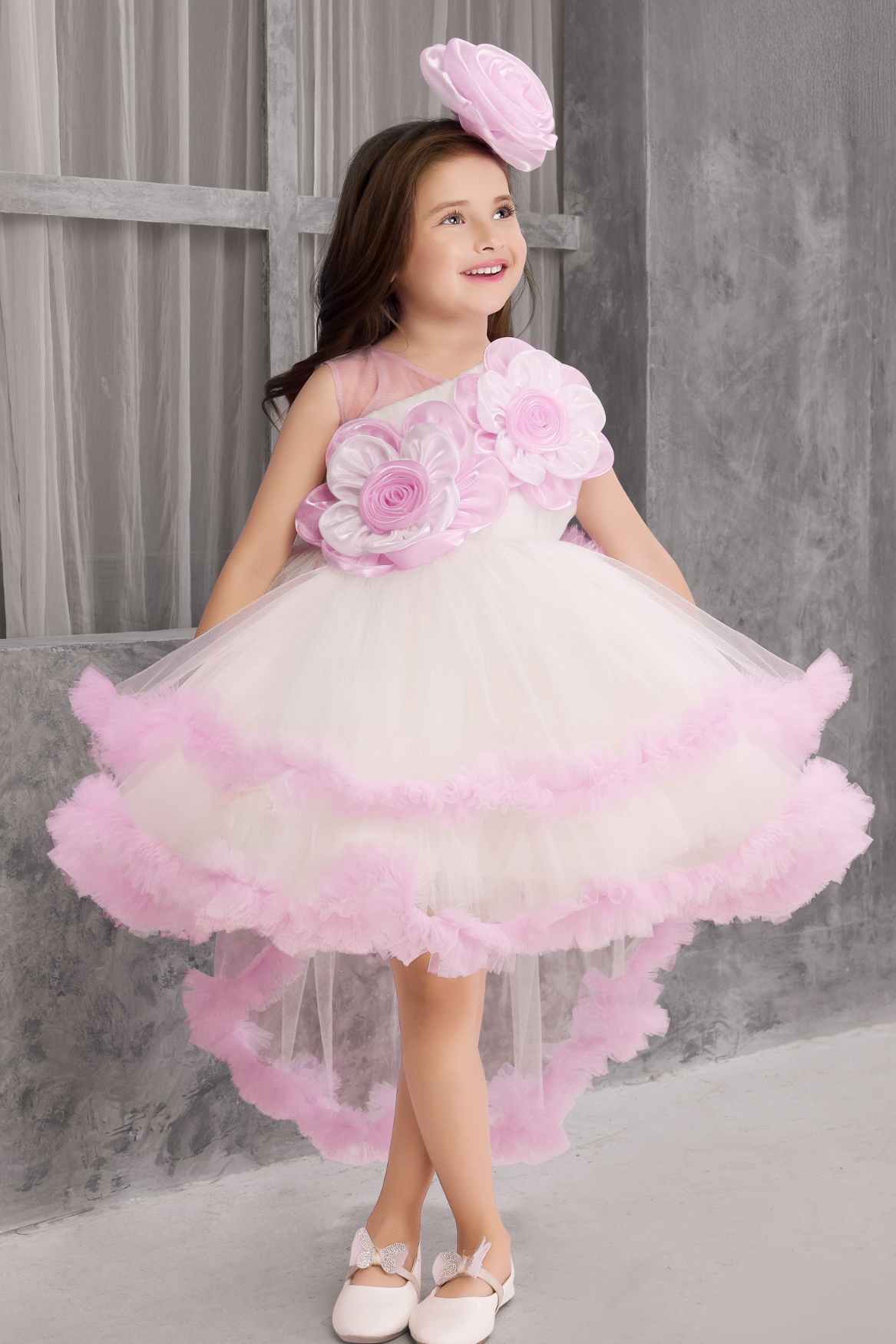 Lavender Ruffled Party Wear Tailback Frock With Floral Embellished For Girls