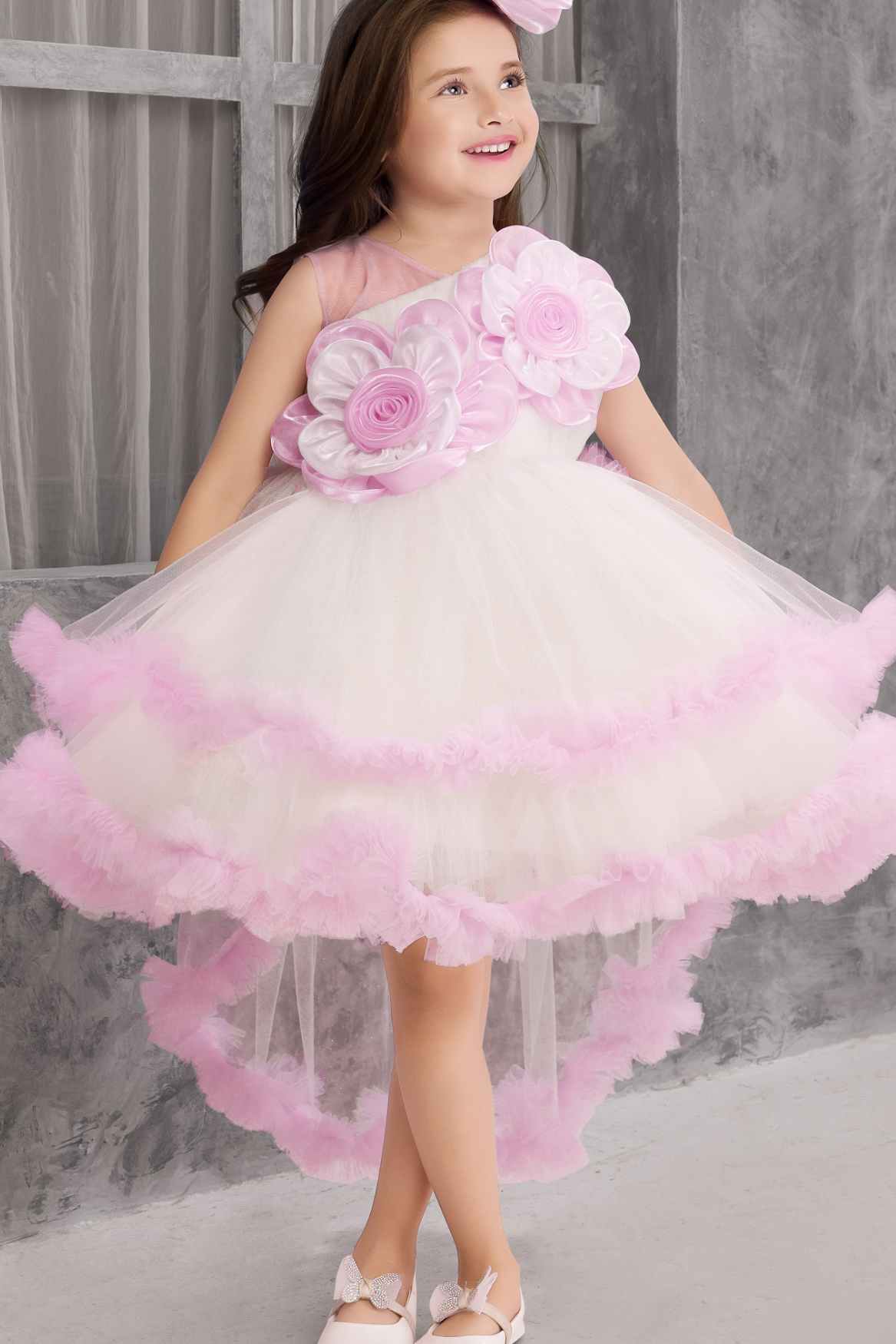 Lavender Ruffled Party Wear Tailback Frock With Floral Embellished For Girls