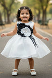 White Party Wear Frock with Oversized Black & Grey Floral Appliqué For Girls