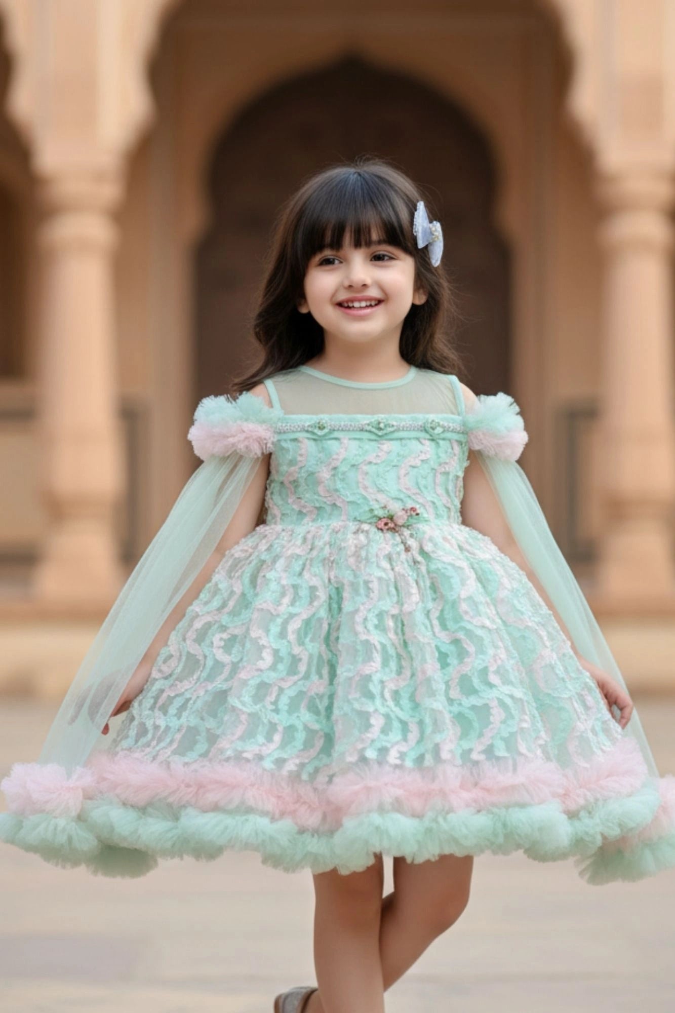 Mint Green And Pink Layered Ruffled Party Wear Frock with Cape For Girls