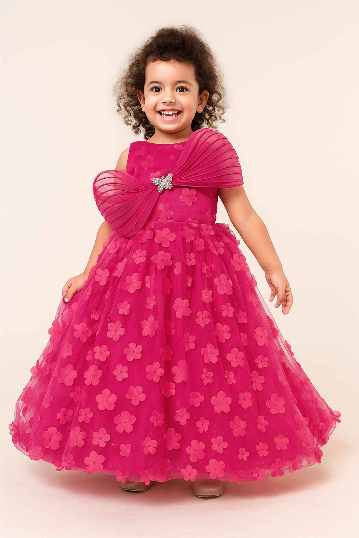 Rani Pink 3D Floral Appliqué Party Gown With Pleated Bow And Butterfly Brooch For Girls