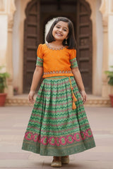 Yellow And Green Printed Silk Pattu Pavadai For Girls
