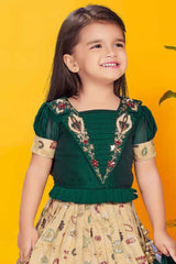 Green And Cream Silk Pattu Pavadai With Gold Foil Print For Girls