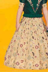 Green And Cream Silk Pattu Pavadai With Gold Foil Print For Girls