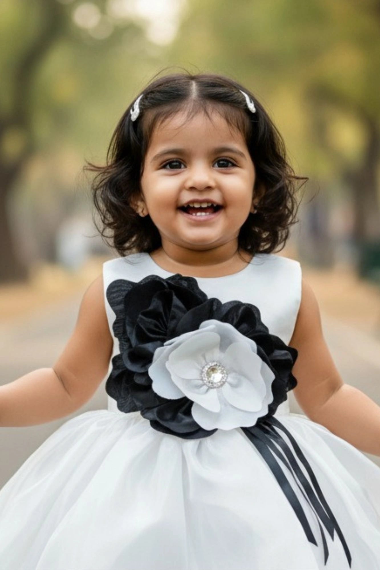 White Party Wear Frock with Oversized Black & Grey Floral Appliqué For Girls