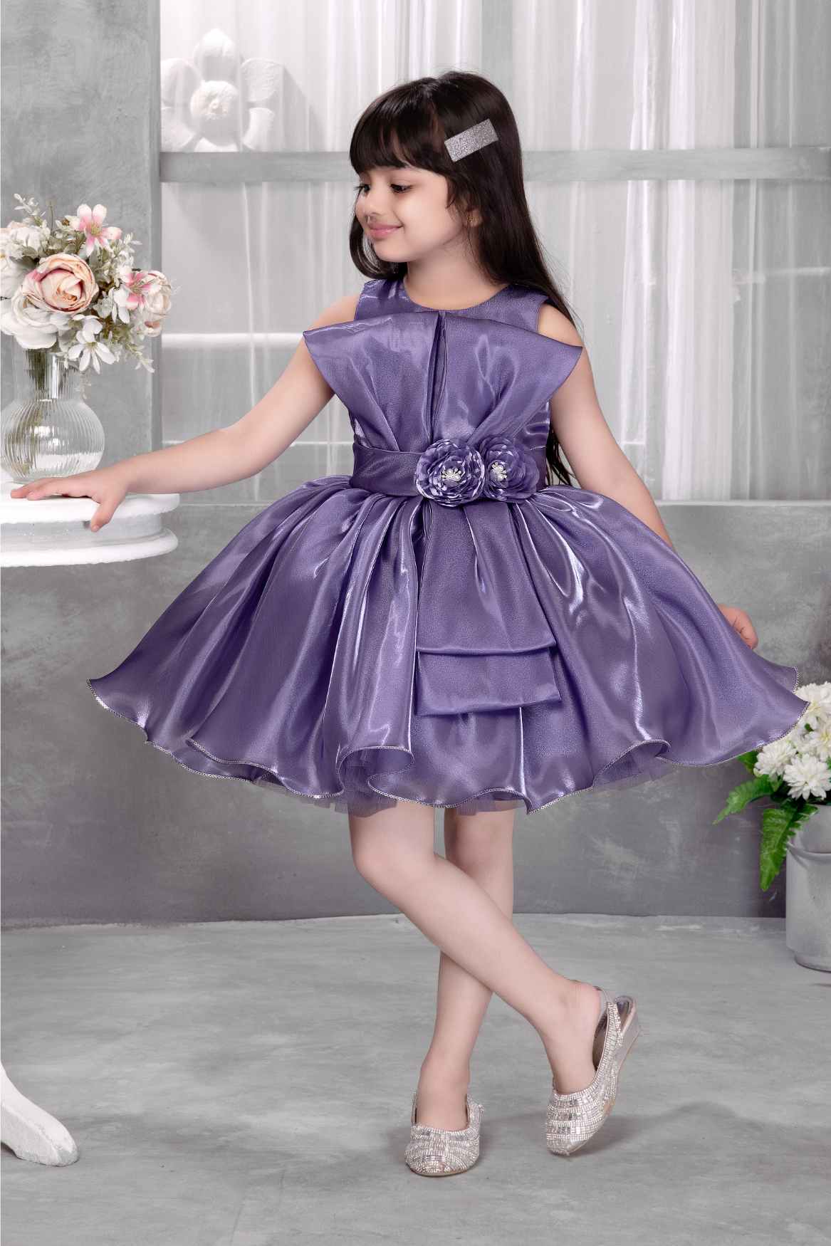 Lavender Party Frock With Floral Waist Detail And Bow Embellished For Girls