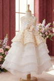 Girls Cream Layered Party Wear Gown with Floral Embroidery And Statement Bow