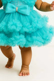 Sea Green Ruffled Net Party Frock With Embellished Bow For Girls