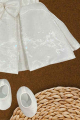 Off White Sleeveless And Bow Embellished Frock For Girls