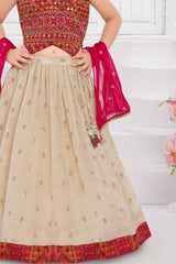 Cream And Rani Pink Mirror Work Embroidered Lehenga And Choli Set For Girls