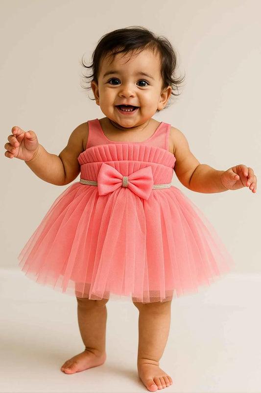 Pink Net Party Wear Frock With Bow Accent For Girls
