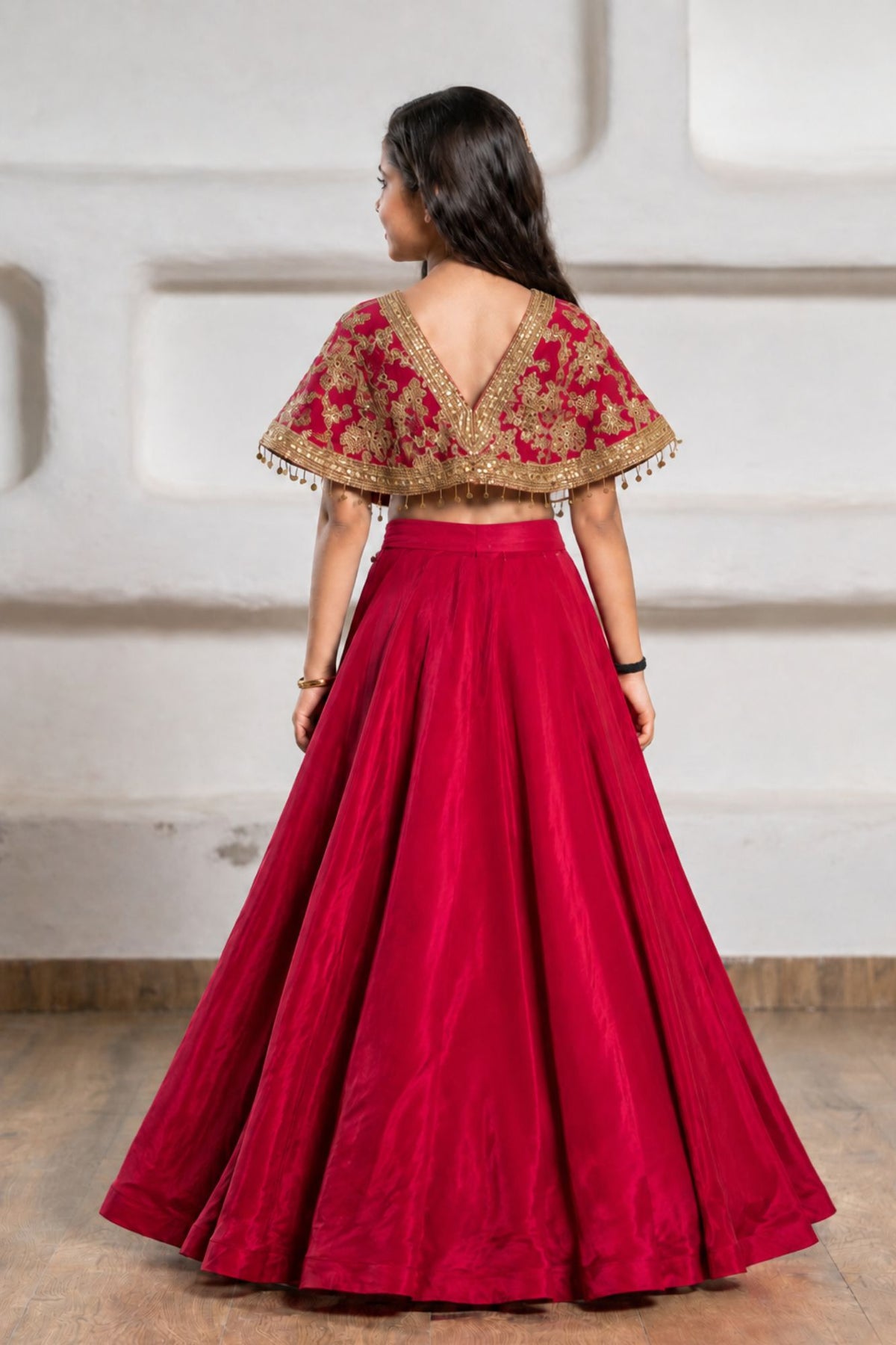 Girls Red And Gold Embroidered Cape Lehenga Choli