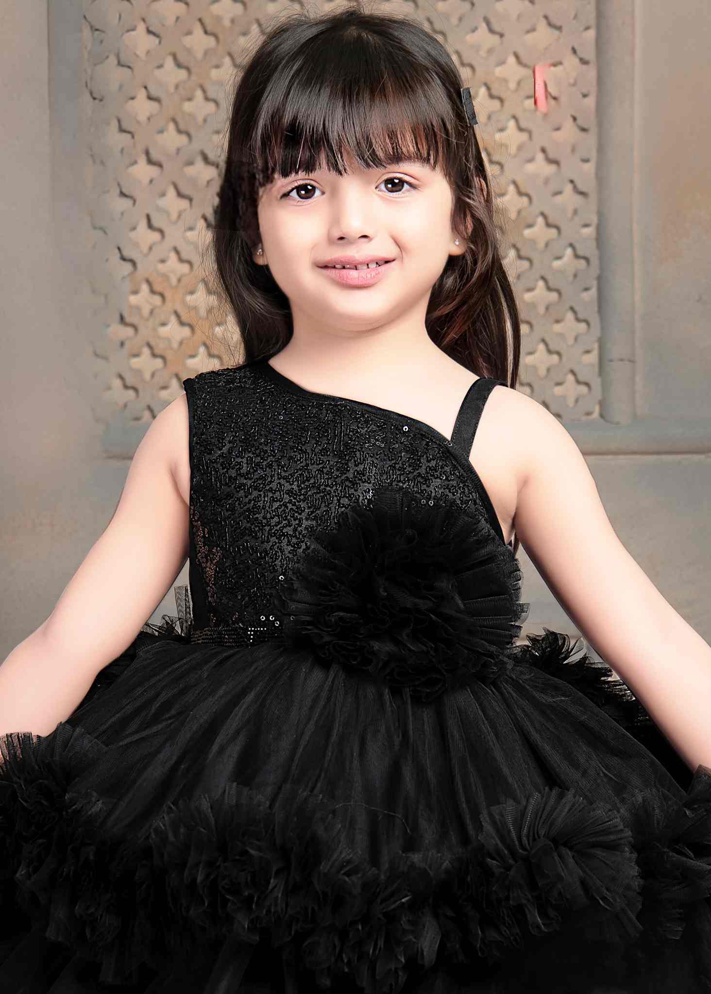 Shimmer Black Tailback Party Wear Frock With Flower Embellishment  For Girls