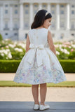 Ivory Floral Party Wear Frock with Golden Jacket And Bow Waist Accent For Girls