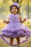 Lavender Embellished Party Wear Frock with 3D Floral Appliqué With Tailback For Girls