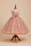 Peach Shimmer Party Gown with Oversized Bow & Floral Accent For Girls