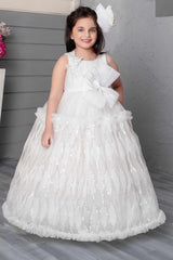 White Sequin Net Party Wear Gown Embellished With Bow For Girls