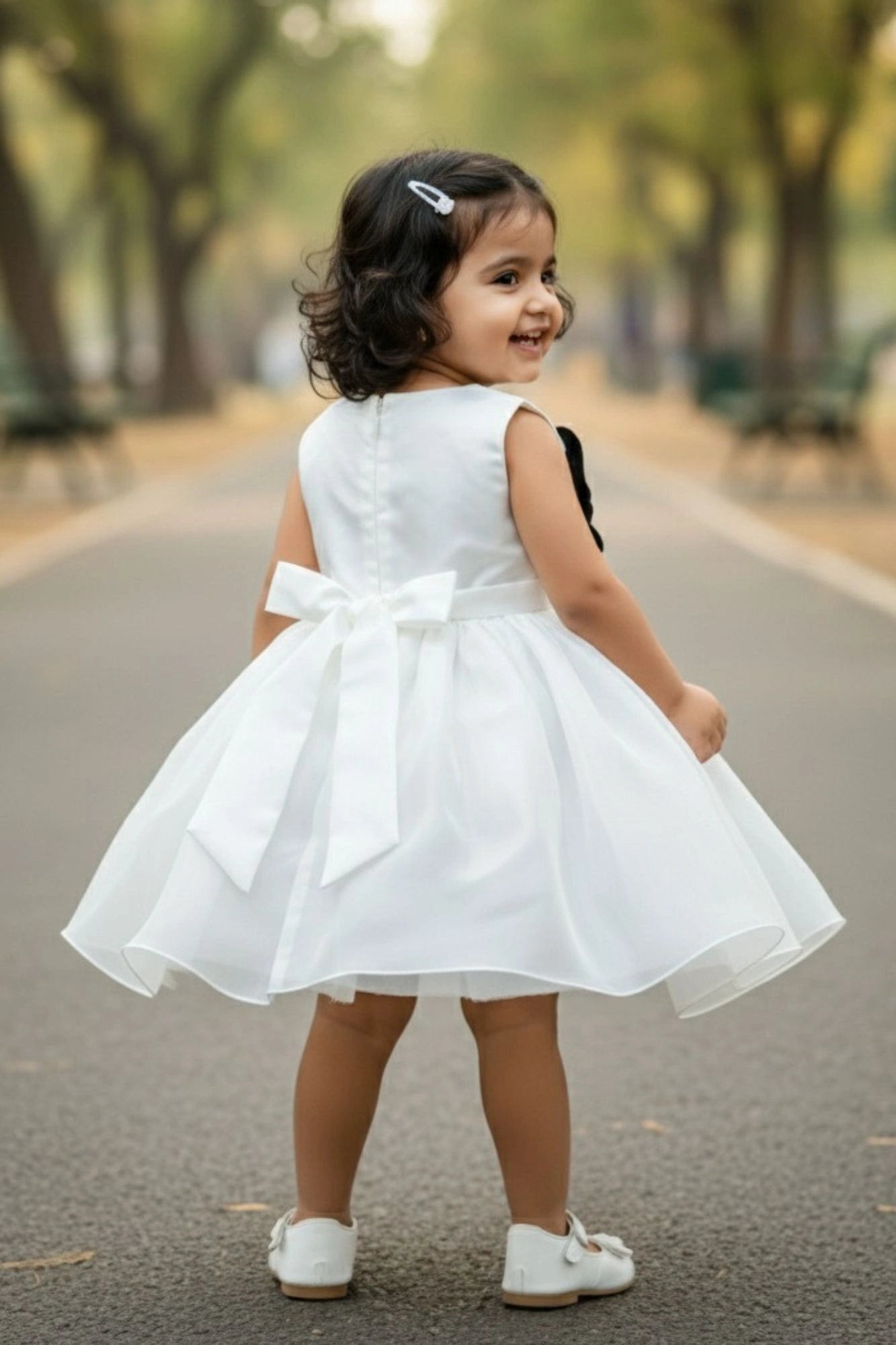 White Party Wear Frock with Oversized Black & Grey Floral Appliqué For Girls