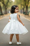 White Party Wear Frock with Oversized Black & Grey Floral Appliqué For Girls