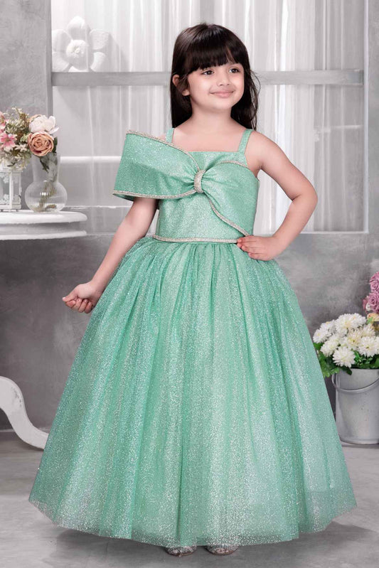 Green Sleeveless And Bow Embellishment With Stone Worked Gown For Girls