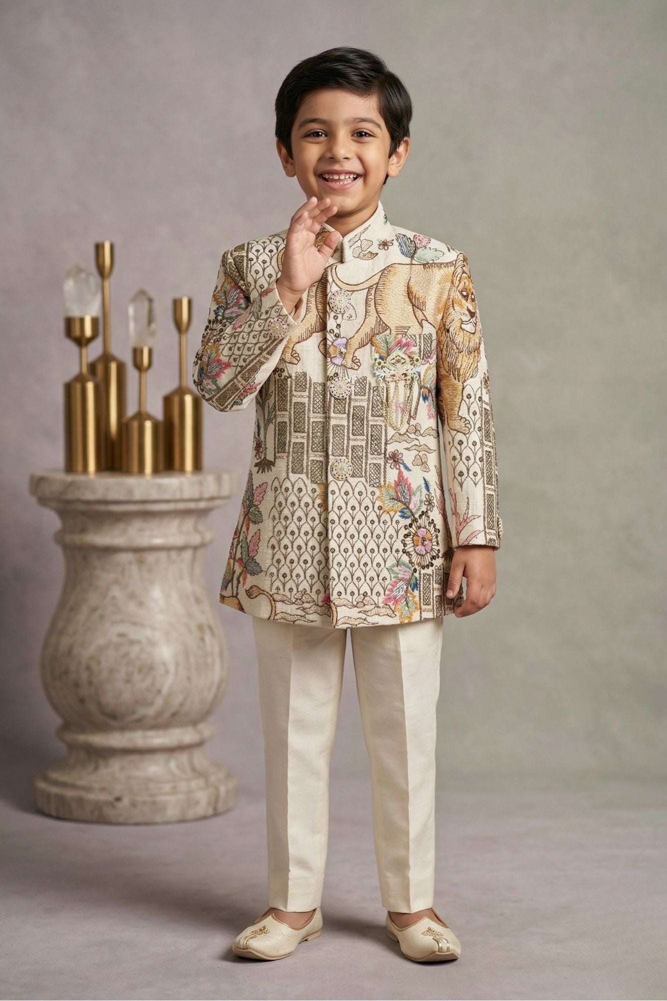 Cream Printed Jodhpuri Suit With Lion Motif And Embroidered Detailing For Boys