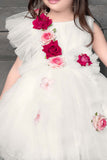 Gorgeous White Tailback Frock With Floral Embellishments For Girls