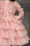 Peach Shimmer Ruffle Frock for Girls.