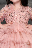 Peach Shimmer Ruffle Frock for Girls.